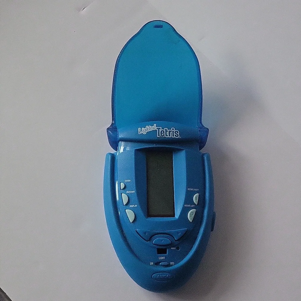 Tetris Lighted Electronic Handheld Travel Game Radica Fliptop Blue 2004 RADICA